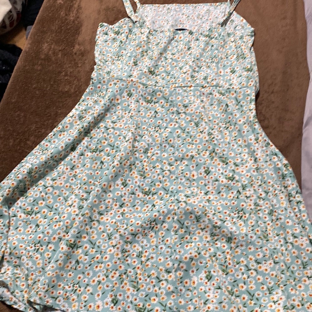 Light pastel green spaghetti strap dress with white flowers